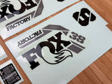 Fox Decal Kit 38 2025 F-S schwarzes Logo / orange Gabel