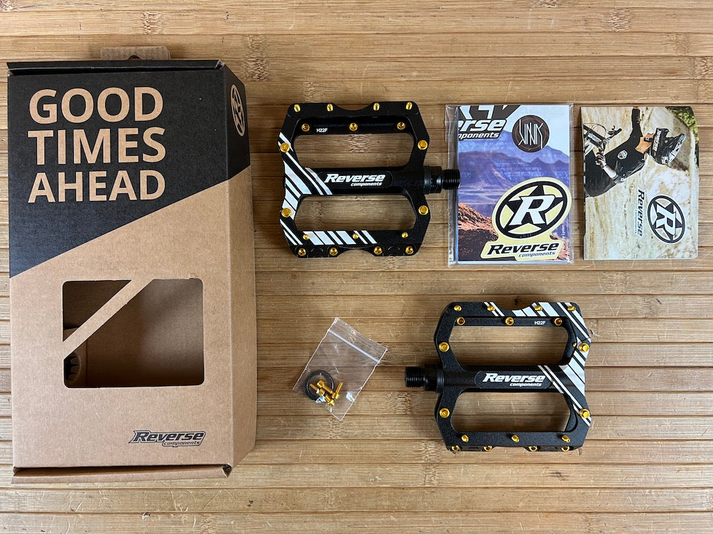 Reverse Components Escape PRO Pedale / Plattformpedale schwarz / gold – RTF Bikeparts