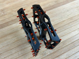 Reverse Components Black One Plattformpedale / Pedale schwarz/orange