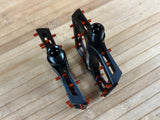Reverse Components Black One Plattformpedale / Pedale schwarz/orange
