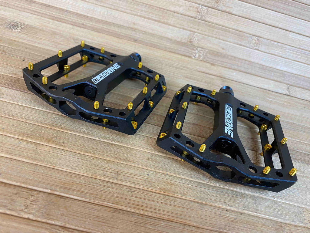 black one pedale Reverse Components Black One Plattformpedale / Pedale schwarz/gold – RTF Bikeparts